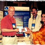 Book presentation to Dr. Todd Rowe President, American Medical College of Homeopathy